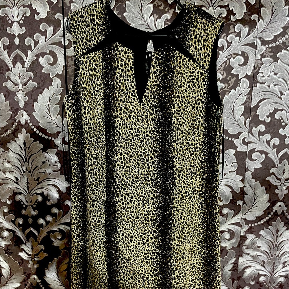 Women dress black with gold shimmer